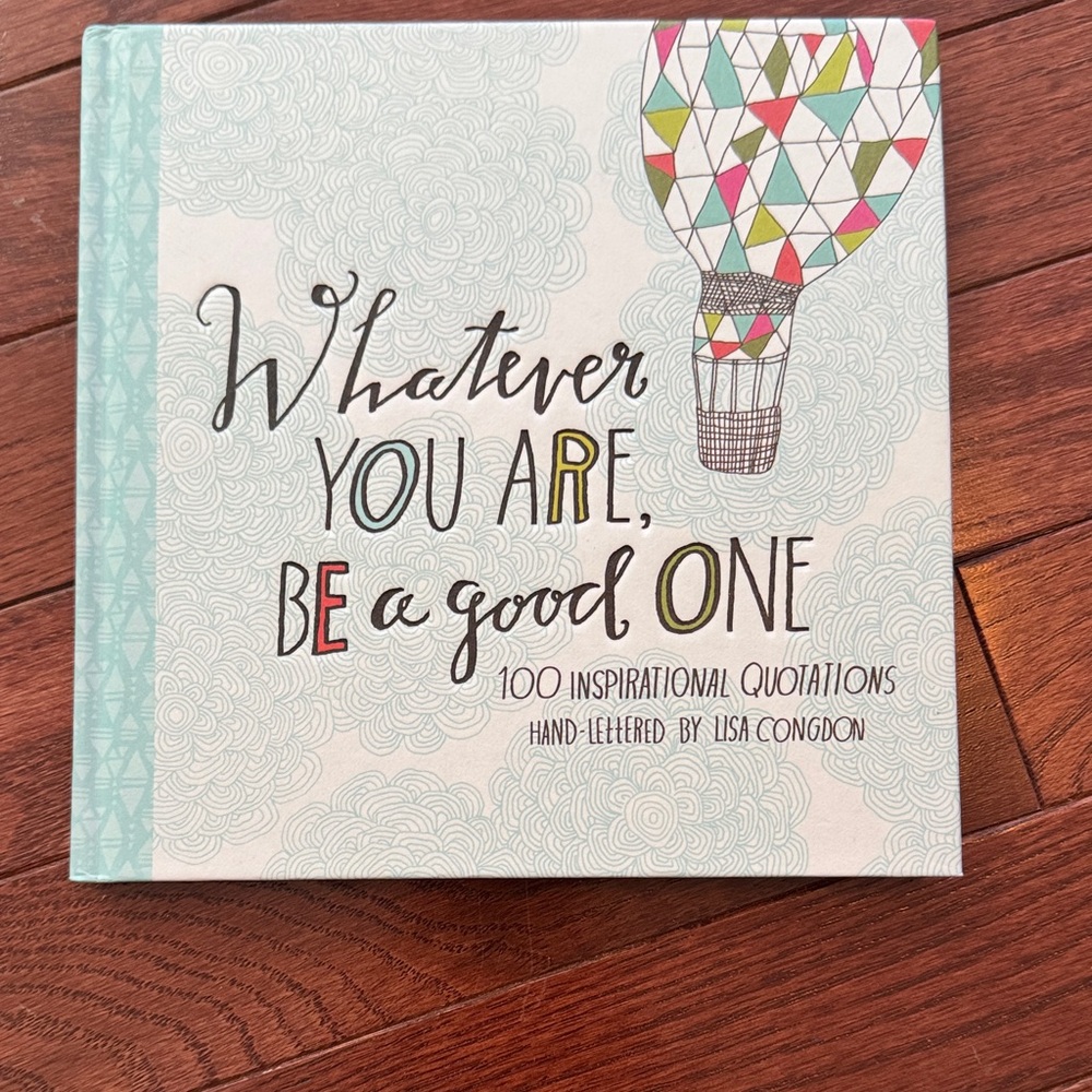 Inspirational Quote Book with Colorful Hot Air Balloon